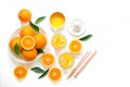 Two glasses of orange juice with ice cubes and oranges isolated on white background top view. Royalty Free Stock Photo