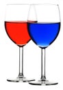 Two glasses of red and blue liquid Royalty Free Stock Photo