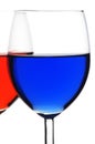Two glasses of red and blue liquid Royalty Free Stock Photo