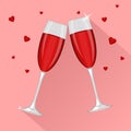 Two glasses of red champagne for Saint Valentines day or 8 March isolated on pink background.