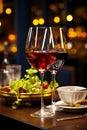 two glasses of red wine against the background of a new and expensive restaurant Royalty Free Stock Photo
