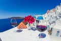 Two glasses of red wine on the background of the sea Royalty Free Stock Photo