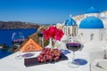 Two glasses of red wine on the background of the sea Royalty Free Stock Photo