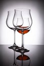 Two glasses with red wine, creating the illusion of four Royalty Free Stock Photo