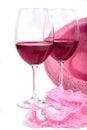Two glasses of red wine near pink panties Royalty Free Stock Photo