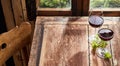 Two glasses of red wine on a rustic table Royalty Free Stock Photo