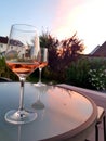 Two glasses of red wine at sunset Royalty Free Stock Photo