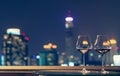 Two glasses of red wine on table of rooftop bar