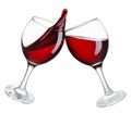 two glasses of red wine in toasting gesture with splash isolated Royalty Free Stock Photo