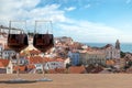 Two glasses of red wine on view of the Lisbon old town in Alfama district in Lisbon, Portugal Royalty Free Stock Photo