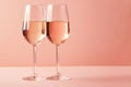 Two glasses of rose sparkling wine, champagne, prosecco on pink background with copy space, ai generated Royalty Free Stock Photo