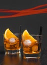 Two glasses of spritz aperitif aperol cocktail with orange slices and ice cubes Royalty Free Stock Photo