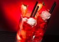 Two glasses of strawberry cocktail with ice on wood table Royalty Free Stock Photo