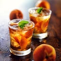 Two glasses of sweet peach iced tea Royalty Free Stock Photo