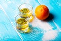 Two glasses on the table and orange fruit Royalty Free Stock Photo