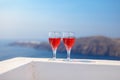 Two glasses of tasty red wine at sunset in Greece Royalty Free Stock Photo