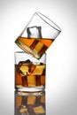 Two Glasses with Whiskey / Rum Drinks with Ice Cubes Royalty Free Stock Photo