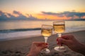 Two glasses on the white sandy beach Royalty Free Stock Photo