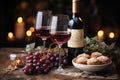 Two glasses of wine, grapes, a bottle of wine, baked goods food on a dark background with golden bokeh Royalty Free Stock Photo