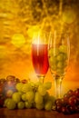 Cups of wine with grapes on a table Royalty Free Stock Photo