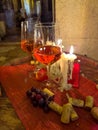 Two glasses of wine in a nighttime candle light dinner, fine dinning setting Royalty Free Stock Photo