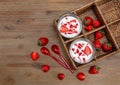 Two Glasses of Yogurt,Red Fresh Strawberries in the Rattan Box with Plastic Spoons on the Wooden Table.Breakfast Organic Healthy Royalty Free Stock Photo