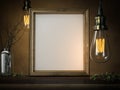 Two glowing vintage bulbs and blank golden frame. 3d rendering Royalty Free Stock Photo
