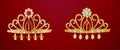 Two gold diadems isolated on red Royalty Free Stock Photo