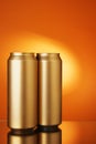 Two golden beer cans Royalty Free Stock Photo
