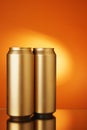 Two golden beer cans