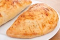 Two Golden Calzone Pizzas Royalty Free Stock Photo
