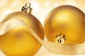 Two golden Christmas baubles Royalty Free Stock Photo
