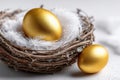 Two golden eggs in a nest with white feathers Royalty Free Stock Photo