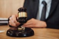 Two golden wedding ring on gavel, Marriage divorce on Judge gave