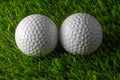 Two golf ball on grass Royalty Free Stock Photo