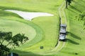 Two golf carts parking on the golf course Royalty Free Stock Photo