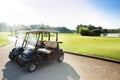 Two golf-carts standing at parking of golf club Royalty Free Stock Photo