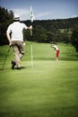 Two golfer on green Royalty Free Stock Photo