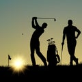 Two golfers silhouette playing on the playground at sunset Royalty Free Stock Photo