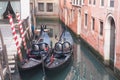 Two gondola in Venice near pier