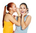 Two gossiping girls Royalty Free Stock Photo