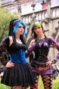 Two gothic girls posing outside