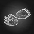 Two graphic strawberries isolated on the chalkboard background