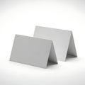 Two gray cardboard boxes standing side by side on a white surface Royalty Free Stock Photo