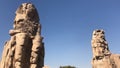 Two great seated stone statues, Colossi of Memnon, Egypt Royalty Free Stock Photo