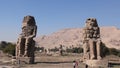 Two great seated stone statues, Colossi of Memnon, Egypt Royalty Free Stock Photo