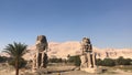 Two great seated stone statues, Colossi of Memnon, Egypt Royalty Free Stock Photo