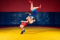 Two greco-roman wrestlers in red and blue uniform Royalty Free Stock Photo