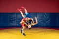 Two greco-roman wrestlers in red and blue uniform Royalty Free Stock Photo