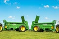 Two green bunning muck spreaders